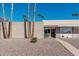 Front view of a single-story home with desert landscaping at 5518 E Lindstrom Ln # A12, Mesa, AZ 85215