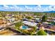 Aerial view of single-Gathering home with pool, desert landscaping, and mountain views at 6030 E Crocus Dr, Scottsdale, AZ 85254