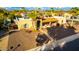 Stunning aerial view of a single-story home with desert landscaping at 6030 E Crocus Dr, Scottsdale, AZ 85254