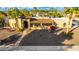 Spanish style home with a tiled roof, and attractive landscaping at 6030 E Crocus Dr, Scottsdale, AZ 85254