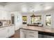 Bright kitchen with breakfast nook overlooking the pool at 6030 E Crocus Dr, Scottsdale, AZ 85254