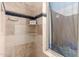 Large shower with tile surround and window at 6030 E Crocus Dr, Scottsdale, AZ 85254