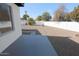 Large backyard with gravel and a patio at 634 E Calavar Rd, Phoenix, AZ 85022