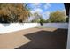 Spacious backyard with gravel and trees at 634 E Calavar Rd, Phoenix, AZ 85022