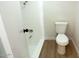 Simple bathroom with a toilet and shower/tub combo at 634 E Calavar Rd, Phoenix, AZ 85022