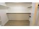 Large walk-in closet with double hanging rods and shelving at 634 E Calavar Rd, Phoenix, AZ 85022