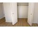 Simple closet with hanging rod and shelving at 634 E Calavar Rd, Phoenix, AZ 85022