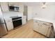 Kitchen with light cabinets, white countertops, and stainless steel appliances at 634 E Calavar Rd, Phoenix, AZ 85022