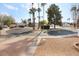 Residential street with palm trees and houses at 634 E Calavar Rd, Phoenix, AZ 85022