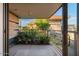 Private balcony with tile flooring and lush landscaping views at 7137 E Rancho Vista Dr # 6010, Scottsdale, AZ 85251