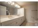 Elegant bathroom with double vanity and updated fixtures at 7137 E Rancho Vista Dr # 6010, Scottsdale, AZ 85251