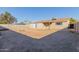 Large backyard with gravel and a fire pit at 7501 E Pierce St, Scottsdale, AZ 85257