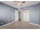 Bedroom with wood-look floors and a mirrored closet at 7501 E Pierce St, Scottsdale, AZ 85257