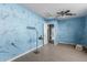 Bedroom with laminate floors and a doorway at 7501 E Pierce St, Scottsdale, AZ 85257