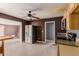 Kitchen features stainless steel refrigerator and wood cabinets at 7501 E Pierce St, Scottsdale, AZ 85257