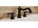 Elegant bathroom faucet with ornate details at 7701 S Butte Ave, Tempe, AZ 85284