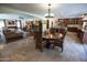 Open concept dining area with view into living room and kitchen at 7701 S Butte Ave, Tempe, AZ 85284