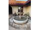 Ornate fountain in the entry courtyard at 7701 S Butte Ave, Tempe, AZ 85284