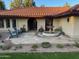 Front entry with fountain and stone patio at 7701 S Butte Ave, Tempe, AZ 85284