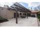 Covered patio with dining area and built-in grill at 7701 S Butte Ave, Tempe, AZ 85284