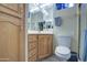 Clean bathroom with wood cabinets and a shower/tub combo at 7750 E Broadway Rd # 83, Mesa, AZ 85208