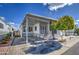 Another view of the home's exterior and carport at 7750 E Broadway Rd # 83, Mesa, AZ 85208