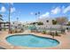 Community pool and spa with fun mural and seating at 8578 E Indian School Rd # I, Scottsdale, AZ 85251