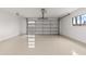 Clean and spacious garage with epoxy flooring at 8602 E Plaza Ave, Scottsdale, AZ 85250