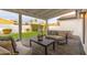 Outdoor patio with seating and a view of the backyard at 8602 E Plaza Ave, Scottsdale, AZ 85250