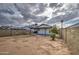 View of the home from the backyard, featuring a covered patio at 8728 W Vale Dr, Phoenix, AZ 85037