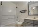 Bathroom with bathtub, toilet, and vanity at 8728 W Vale Dr, Phoenix, AZ 85037