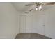 Bedroom with double door closet and carpet flooring at 8728 W Vale Dr, Phoenix, AZ 85037