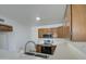 Modern kitchen with stainless steel appliances at 8728 W Vale Dr, Phoenix, AZ 85037