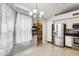 Cozy dining area with a view of the pantry through the door at 8818 W Virginia Ave, Phoenix, AZ 85037