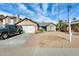 Charming single-story home with a two car garage and low maintenance landscaping at 8818 W Virginia Ave, Phoenix, AZ 85037