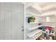 Pantry featuring multiple shelves, providing ample storage space at 8818 W Virginia Ave, Phoenix, AZ 85037