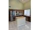 Kitchen with stainless steel appliances and an island at 8862 E Sheena Dr, Scottsdale, AZ 85260