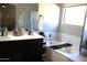 Bathroom boasts double sinks and a relaxing bathtub at 9024 W Alda Way, Peoria, AZ 85382