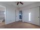 Cozy bedroom with carpet flooring and sliding door closet at 909 W Elm Ave, Coolidge, AZ 85128