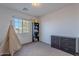 Bedroom with bookshelf, dresser, and teepee at 909 W Elm Ave, Coolidge, AZ 85128