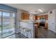 Kitchen features wood cabinets, stainless steel appliances, and a view of the backyard at 909 W Elm Ave, Coolidge, AZ 85128