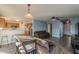 Open floor plan showing kitchen with stainless steel appliances and adjacent living room at 909 W Elm Ave, Coolidge, AZ 85128