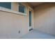 Small patio with exterior door access at 909 W Elm Ave, Coolidge, AZ 85128