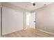 Bright bedroom with light flooring and mirrored closet doors at 956 W Hudson Way, Gilbert, AZ 85233