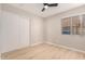 Spacious bedroom featuring light walls and wood-look flooring at 956 W Hudson Way, Gilbert, AZ 85233