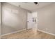 Well-lit bedroom with door leading to another room at 956 W Hudson Way, Gilbert, AZ 85233