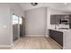 Modern kitchen with stainless steel appliances and marble countertops at 956 W Hudson Way, Gilbert, AZ 85233