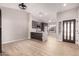 Open living room with light flooring and modern kitchen view at 956 W Hudson Way, Gilbert, AZ 85233