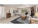 Bright living room featuring a neutral color palette and tiled floors at 9601 W Greenhurst Dr, Sun City, AZ 85351