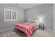 Charming bedroom with a colorful bedspread at 1040 N 113Th Pl, Mesa, AZ 85207